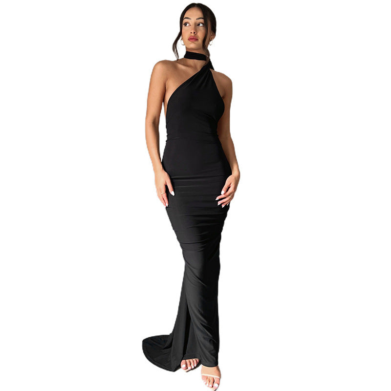 A backless, off-the-neck, body-hugging evening dress