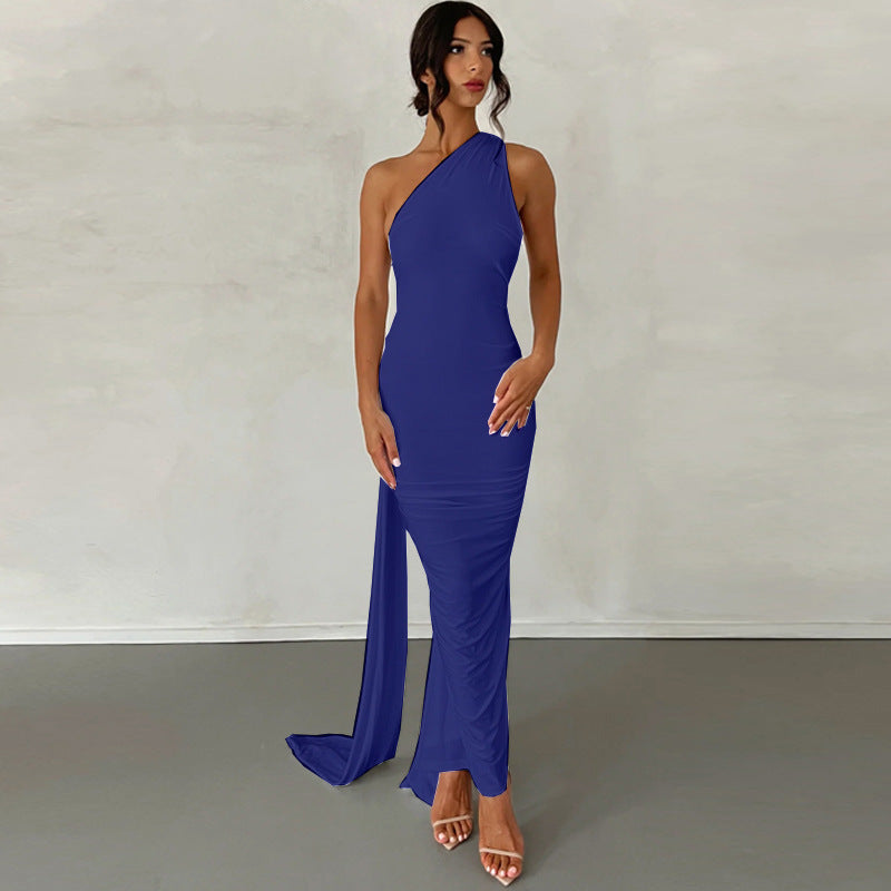 A backless, off-the-neck, body-hugging evening dress