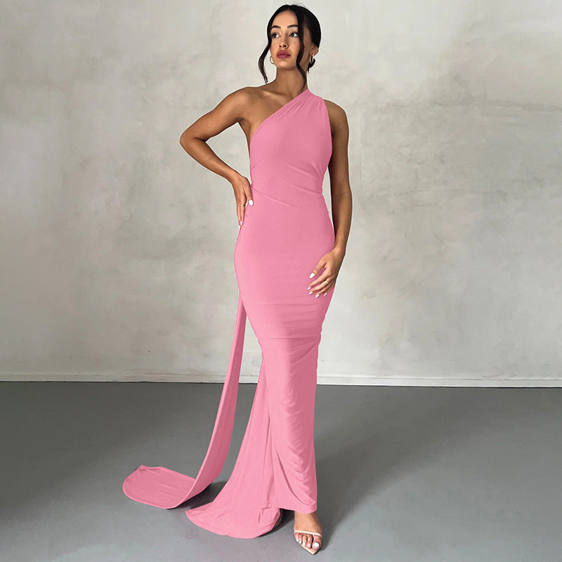 A backless, off-the-neck, body-hugging evening dress